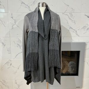 Woman’s dress and cape sweater